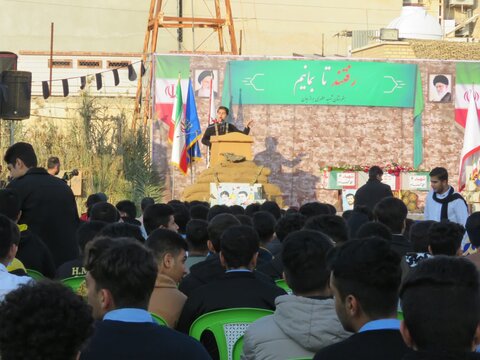 تصاویر/ تشییع شهید گمنام بر دستان دانش‌آموزان برازجان