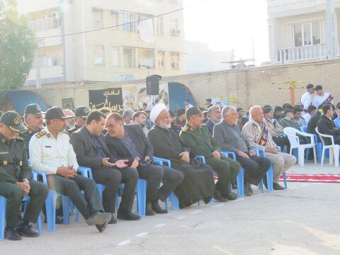 تصاویر/ تشییع شهید گمنام بر دستان دانش‌آموزان برازجان