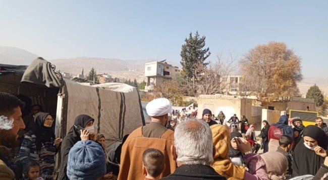 مكتب المرجع السيستاني يباشر بتوزيع المساعدات للنازحين السوريين في لبنان + صور