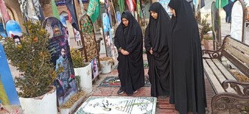 تصاویر/ غبارروبی مزار شهدا توسط طلاب مدرسه علمیه حضرت زهرا (س)سنجان