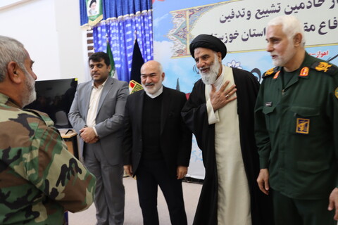 آیین تجلیل از خادمین تشییع و تدفین 14 شهید گمنام دفاع مقدس در خوزستان