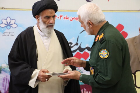 آیین تجلیل از خادمین تشییع و تدفین 14 شهید گمنام دفاع مقدس در خوزستان