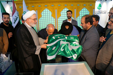 تصاویر/ قرعه کشی تبرکات عتبه حسینیه در سی و دومین نمایشگاه بین المللی قرآن کریم