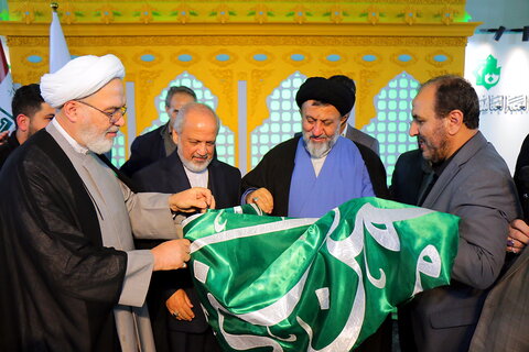 تصاویر/ قرعه کشی تبرکات عتبه حسینیه در سی و دومین نمایشگاه بین المللی قرآن کریم