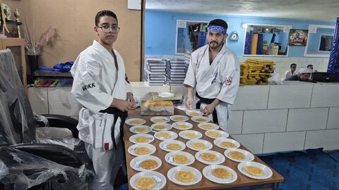 محفل انس با قرآن کریم و یادواره باشگاه محور به یاد شهید ورزشکار حسن جزینی زاده در شهر کرمان