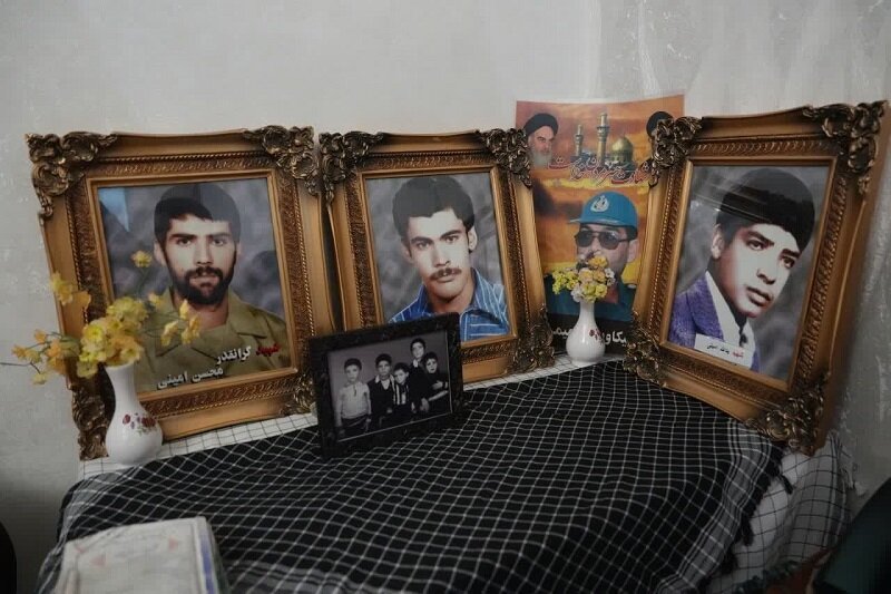 تجلیل استاندار کرمانشاه از جانباز سرافراز و خانواده شهیدان امینی+عکس