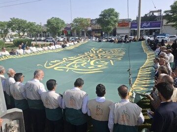 تصاویر/ اهتزاز پرچم رضوی در میدان جهاد کاشان