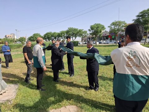 تصاویر/ اهتزاز پرچم رضوی در میدان جهاد کاشان