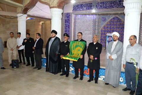 تصاویر/ ادای احترام خادمان امام رضا(ع) به شهدای بوشهر