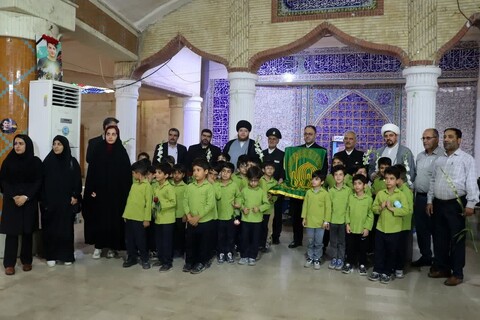 تصاویر/ ادای احترام خادمان امام رضا(ع) به شهدای بوشهر