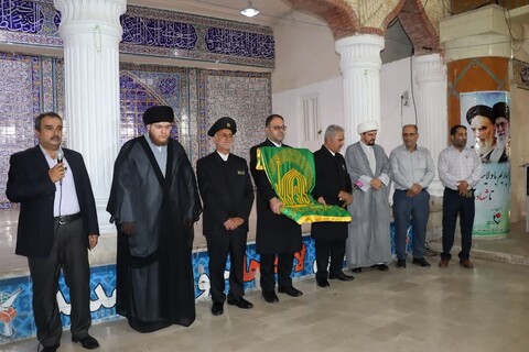 تصاویر/ ادای احترام خادمان امام رضا(ع) به شهدای بوشهر