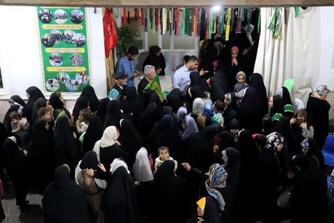 عطر افشانی مدرسه علمیه خواهران برازجان با پرچم متبرک امام رضا (ع)