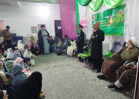 عطر افشانی مدرسه علمیه خواهران برازجان با پرچم متبرک امام رضا (ع)