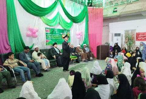 عطر افشانی مدرسه علمیه خواهران برازجان با پرچم متبرک امام رضا (ع)