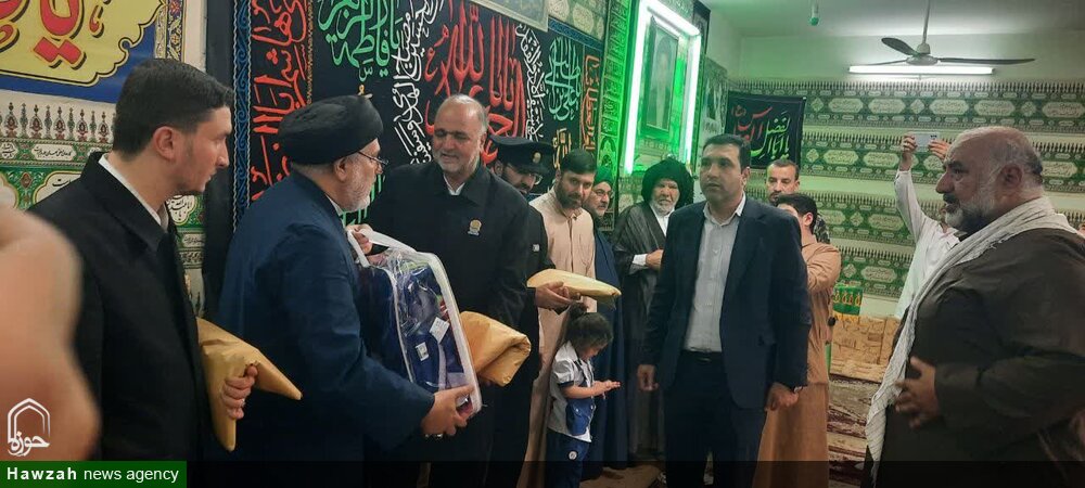 دیدار خادمین حرم مطهر رضوی با خانواده شهدا در شهرستان باوی