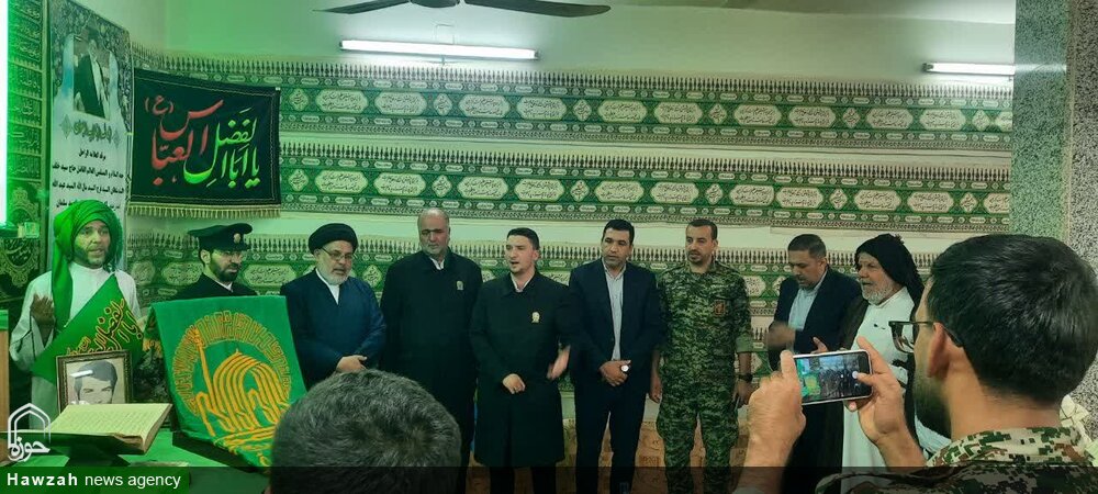 دیدار خادمین حرم مطهر رضوی با خانواده شهدا در شهرستان باوی