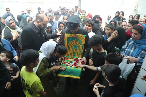 حضور خادمین حرم مطهر رضوی در بندرامام خمینی (ره)