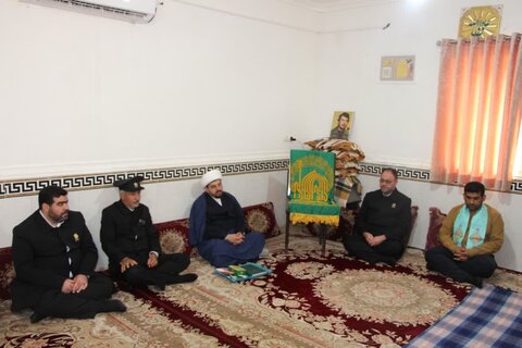 تصاویر/ تجلیل از مادر شهید تاج الدین توسط خدام رضوی