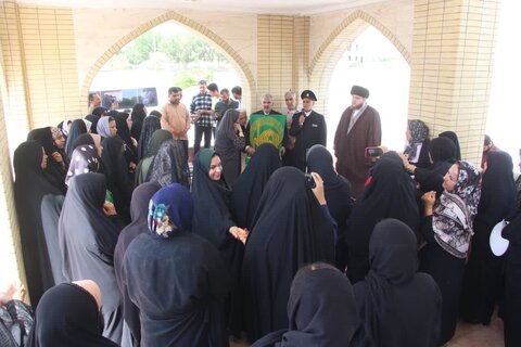 تصاویر/ ادای احترام خادمان رضوی به شهدا در شهر کلمه