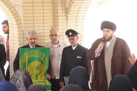 تصاویر/ ادای احترام خادمان رضوی به شهدا در شهر کلمه