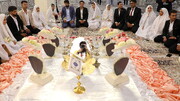 फ़ोटो / 325 युवा जोड़े हज़रत फातिमा मासूमा (स) की दरगाह पर अपनी शादी का जश्न मनाते हुए