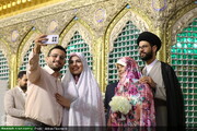 بالصور/ احتفال زواج جماعي لـ325 زوجًا شابًا في العتبة المعصومية المقدسة بمدينة قم
