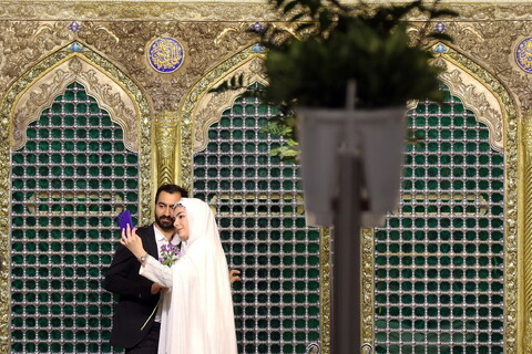تصاویر/ جشن ازدواج ۳۲۵ زوج جوان در حرم حضرت فاطمه معصومه (س)