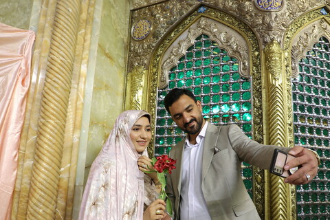 تصاویر/ جشن ازدواج ۳۲۵ زوج جوان در حرم حضرت فاطمه معصومه (س)