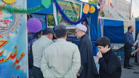 تصاویر/ مهمونی کیلومتری غدیر در شهرستان رابر با رنگ و بوی شهدا