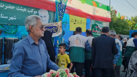 تصاویر/ مهمونی کیلومتری غدیر در شهرستان رابر با رنگ و بوی شهدا