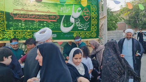تصاویر/ مهمونی کیلومتری غدیر در شهرستان رابر با رنگ و بوی شهدا