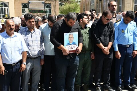 تصاویر/ تشییع پیکر شهید "محسن آین" در گلزار شهدای خوی