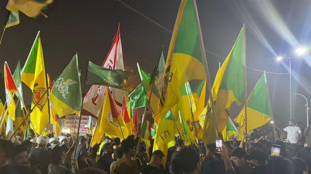 المئات يتظاهرون وسط بغداد تضامناً مع ايران