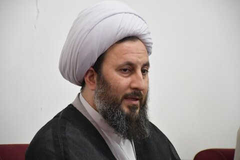 تصاویر/ دیدار امام جمعه خوی با ۲ خانواده شهید