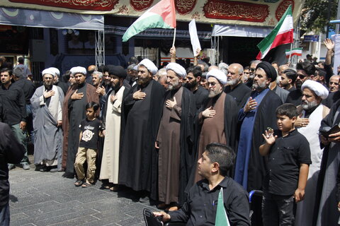 تصاویر / مراسم روز سقا وگرامیداشت علمدار مقاومت شهید حاجی زاده در قزوین