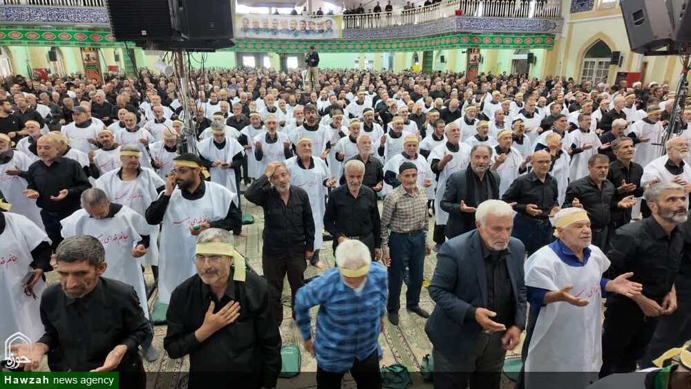 حرکت نمادین نمازگزاران همدانی؛ ایستادگی با کفن در خط مقدم دفاع از انقلاب+عکس و فیلم