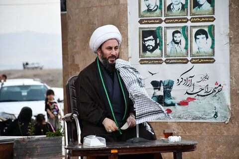 تصاویر/ مراسم عصر تاسوعای حسینی محرم الحرام در تپه شهدای گمنام خوی