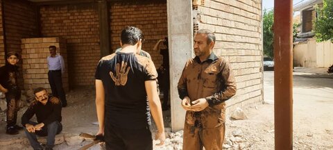 تصاویر/آیین گل‌مالی در شهرستان دره‌شهر