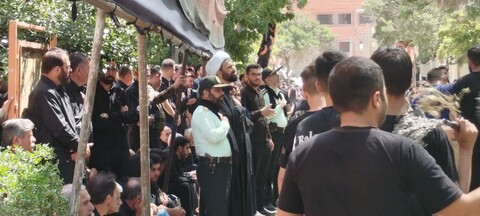 تصاویر / اقامه نماز ظهر عاشورا در شهرستان بهار