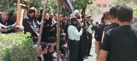 تصاویر / اقامه نماز ظهر عاشورا در شهرستان بهار