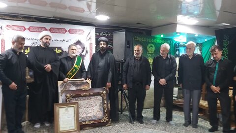 تکریم حاج حسین سلوک خادم و پیرغلام حسینی حاج حسین  سلوک در خرم آباد