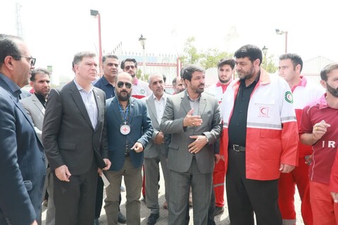 تصاویر / ادای احترام رئیس جمعیت هلال احمر کشور  به شهید امدادگر