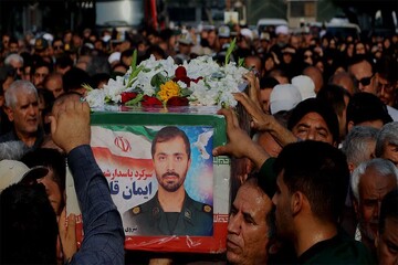 پیکر شهید ایمان قائدی در آغوش مردم بوشهر قرار گرفت