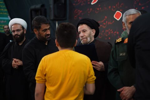 تصاویر مراسم یادبود اربعین شهدای جنگ تحمیلی ۱۲ روزه بد حضور نماینده ولی فقیه در استان لرستان