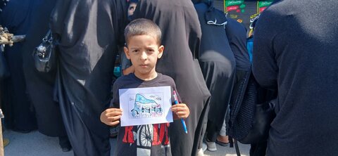 تصاویر/حضور کادر و طلاب مدرسه علمیه الهیه ساوه در پیاده‌روی جاماندگان اربعین