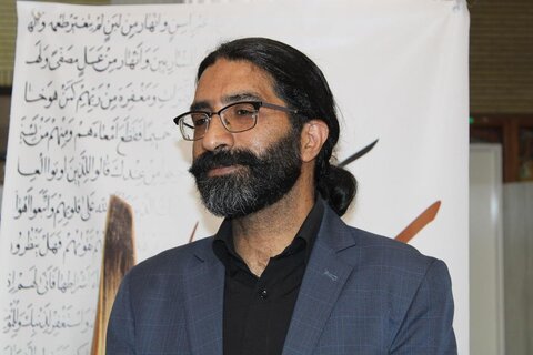 عکس / رونمایی از قرآن کتابت شده هنرمند چهارمحال و بختیاری