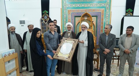 تصاویر/ برگزاری آیین پاسداشت چهره ماندگار قرآنی استان در گلزار شهدای بوشهر