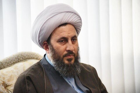 تصاویر/ دیدار امام جمعه خوی با دو خانواده شهید