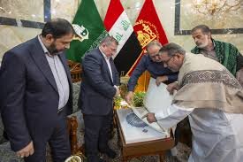 Iranian calligraphers gift a handwritten copy of the Holy Quran to the Al-Abbas's (p) Holy Shrine