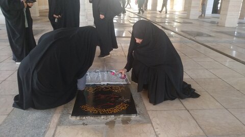 تصاویر/ غبارروبی قبور شهدا توسط طلاب مدرسه علمیه خواهران خورموج